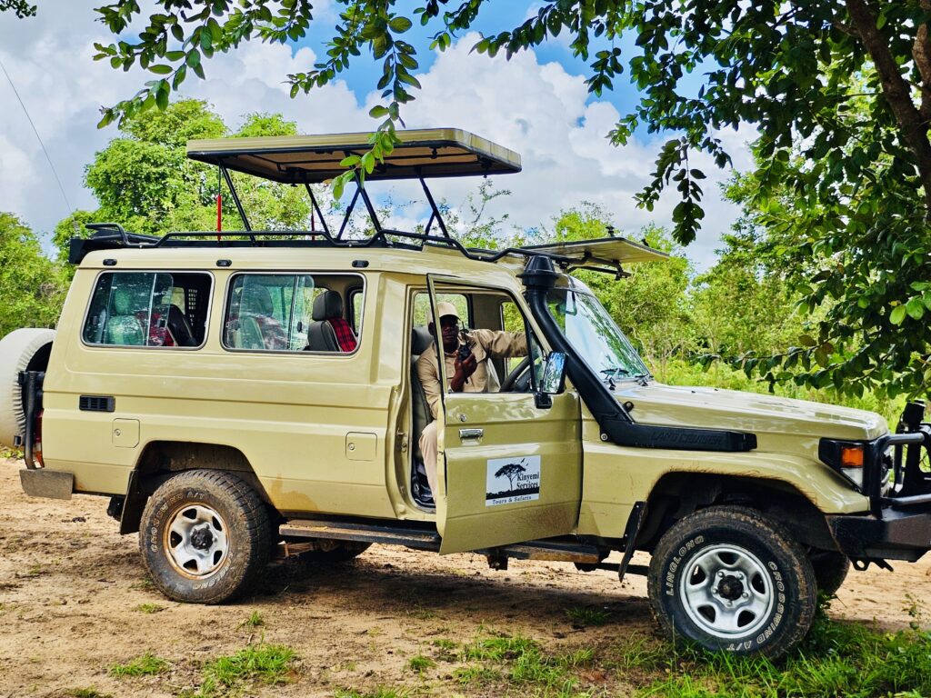 Safari Guide in Safari Vehicle